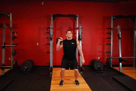 Tek El Kettlebell Çıkartması — bitiş pozisyonu