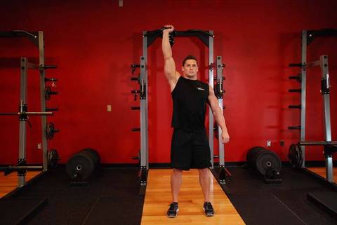 Tek El Kettlebell Para Pres — bitiş pozisyonu