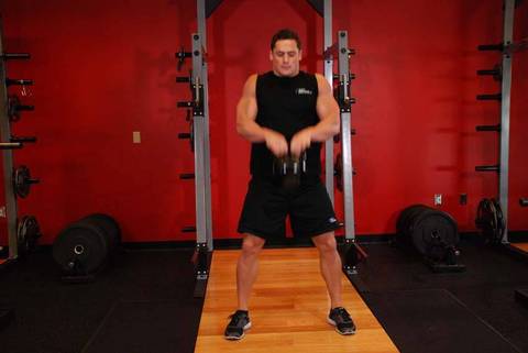 Açık Avuç Kettlebell Clean — bitiş pozisyonu