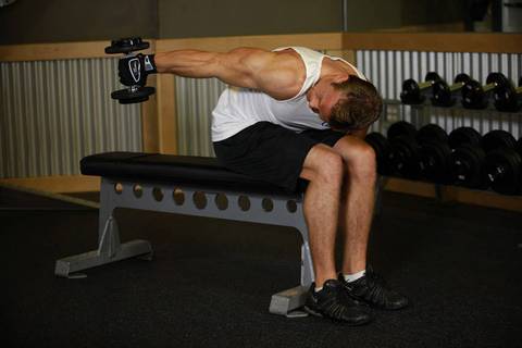 Seated Bent-Over One-Arm Dumbbell Triceps Extension — bitiş pozisyonu