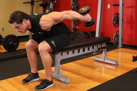 Seated Bent-Over Two-Arm Dumbbell Triceps Extension — bitiş pozisyonu
