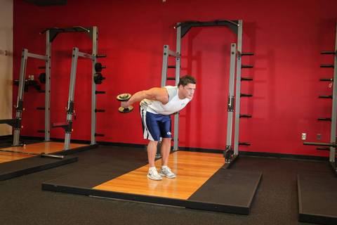 Standing Bent-Over Two-Arm Dumbbell Triceps Extension — bitiş pozisyonu